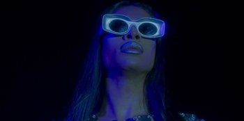 Movie still from “Dua Lipa - Levitating feat. Madonna & Missy Elliott” (2020), directed by Will Hooper – Close Up shot, Low angle