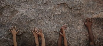 Movie still from “AMAARA - Desert Storm” (2020), directed by Kaelen Ohm – Extreme Close Up shot, Overhead angle