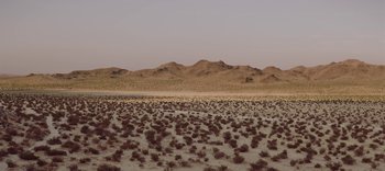 Movie still from “AMAARA - Desert Storm” (2020), directed by Kaelen Ohm – Extreme Wide shot, High angle