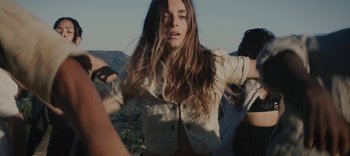 Movie still from “AMAARA - Desert Storm” (2020), directed by Kaelen Ohm – Medium shot, Low angle