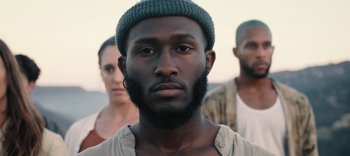 Movie still from “AMAARA - Desert Storm” (2020), directed by Kaelen Ohm – Close Up shot, Over the shoulder angle