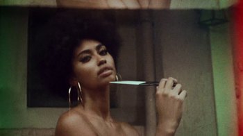 Movie still from “SAINt JHN - Roses (Remix) feat. Future” (2020), directed by John Tashiro – Close Up shot, Low angle