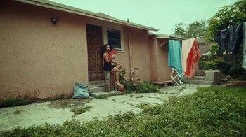 Movie still from “SAINt JHN - Roses (Remix) feat. Future” (2020), directed by John Tashiro – Wide shot, Low angle