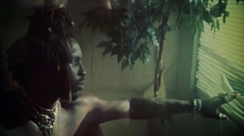 Movie still from “SAINt JHN - Roses (Remix) feat. Future” (2020), directed by John Tashiro – Extreme Close Up shot, Low angle