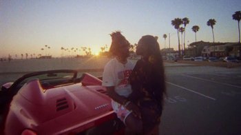 Movie still from “SAINt JHN - Roses (Remix) feat. Future” (2020), directed by John Tashiro – Medium shot, Low angle