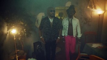 Movie still from “SAINt JHN - Roses (Remix) feat. Future” (2020), directed by John Tashiro – Medium shot, Low angle