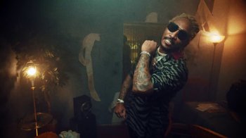 Movie still from “SAINt JHN - Roses (Remix) feat. Future” (2020), directed by John Tashiro – Medium shot, Low angle