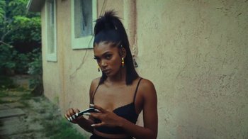 Movie still from “SAINt JHN - Roses (Remix) feat. Future” (2020), directed by John Tashiro – Close Up shot, Over the shoulder angle