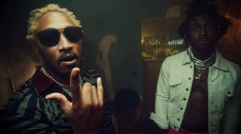 Movie still from “SAINt JHN - Roses (Remix) feat. Future” (2020), directed by John Tashiro – Close Up shot, Low angle