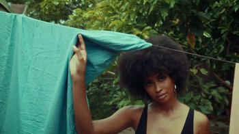 Movie still from “SAINt JHN - Roses (Remix) feat. Future” (2020), directed by John Tashiro – Medium shot, Low angle