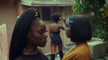 Movie still from “SAINt JHN - Roses (Remix) feat. Future” (2020), directed by John Tashiro – Close Up shot, Over the shoulder angle