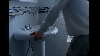 Movie still from “SPACE CADE7S - What’s Missing?” (2020), directed by Jake L. Mitchell – Medium shot, High angle