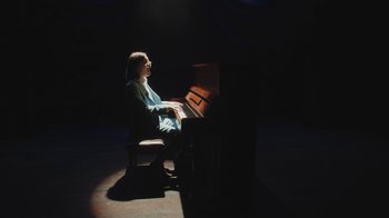 Movie still from “Dent May - I Could Use A Miracle” (2020), directed by Nathan Castiel – Medium shot, High angle