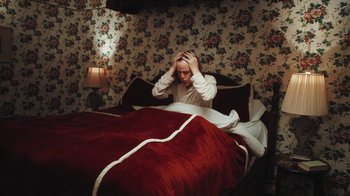 Movie still from “Dent May - I Could Use A Miracle” (2020), directed by Nathan Castiel – Medium shot, High angle