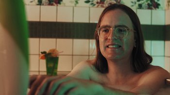 Movie still from “Dent May - I Could Use A Miracle” (2020), directed by Nathan Castiel – Close Up shot, Over the shoulder angle