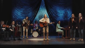 Movie still from “Dent May - I Could Use A Miracle” (2020), directed by Nathan Castiel – Wide shot, Low angle