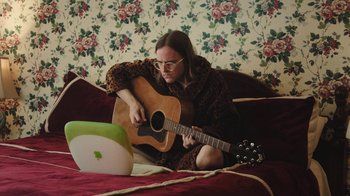 Movie still from “Dent May - I Could Use A Miracle” (2020), directed by Nathan Castiel – Medium shot, High angle