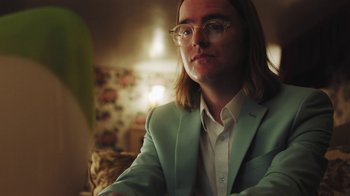 Movie still from “Dent May - I Could Use A Miracle” (2020), directed by Nathan Castiel – Close Up shot, Over the shoulder angle
