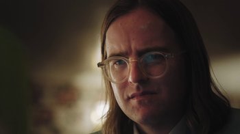 Movie still from “Dent May - I Could Use A Miracle” (2020), directed by Nathan Castiel – Close Up shot, Low angle