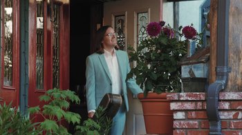 Movie still from “Dent May - I Could Use A Miracle” (2020), directed by Nathan Castiel – Medium shot, Low angle