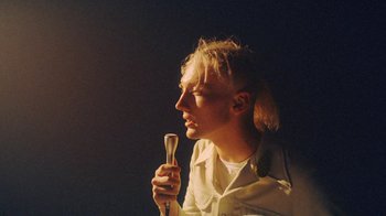 Movie still from “Yellow Days - Love Is Everywhere” (2020), directed by Kevin Lombardo – Close Up shot, Low angle