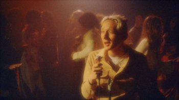 Movie still from “Yellow Days - Love Is Everywhere” (2020), directed by Kevin Lombardo – Medium shot, Low angle