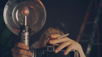 Movie still from “Yellow Days - Love Is Everywhere” (2020), directed by Kevin Lombardo – Extreme Close Up shot, Overhead angle