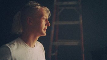 Movie still from “Yellow Days - Love Is Everywhere” (2020), directed by Kevin Lombardo – Close Up shot, Over the shoulder angle