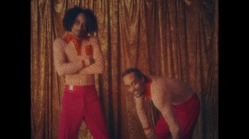Movie still from “Yellow Days - Love Is Everywhere” (2020), directed by Kevin Lombardo – Medium shot, Low angle