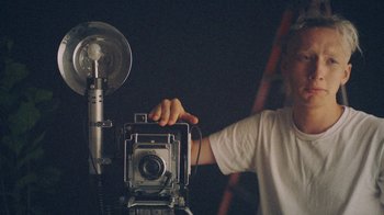 Movie still from “Yellow Days - Love Is Everywhere” (2020), directed by Kevin Lombardo – Close Up shot, Low angle