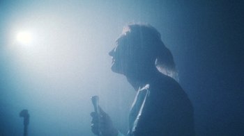 Movie still from “Yellow Days - Love Is Everywhere” (2020), directed by Kevin Lombardo – Medium shot, Low angle