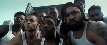 Movie still from “Rodney Chrome - Pulpit” (2020), directed by Zachary Dov Wiesel – Close Up shot, Low angle