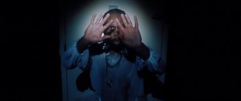 Movie still from “Rodney Chrome - Pulpit” (2020), directed by Zachary Dov Wiesel – Extreme Close Up shot, Overhead angle