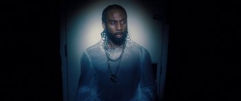 Movie still from “Rodney Chrome - Pulpit” (2020), directed by Zachary Dov Wiesel – Close Up shot, Low angle