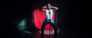 Movie still from “Rodney Chrome - Pulpit” (2020), directed by Zachary Dov Wiesel – Medium shot, Low angle