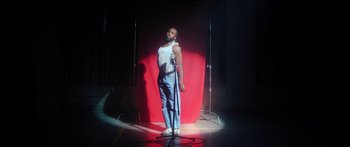 Movie still from “Rodney Chrome - Pulpit” (2020), directed by Zachary Dov Wiesel – Medium shot, Low angle