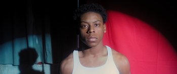 Movie still from “Rodney Chrome - Pulpit” (2020), directed by Zachary Dov Wiesel – Close Up shot, Low angle