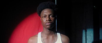 Movie still from “Rodney Chrome - Pulpit” (2020), directed by Zachary Dov Wiesel – Close Up shot, Low angle