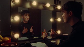 Movie still from “Declan McKenna - The Key to Life on Earth” (2020), directed by Will Hooper – Medium shot, Over the shoulder angle