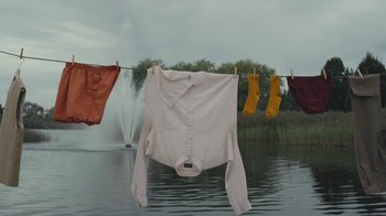 Movie still from “Alex Nicol - Trust” (2020), directed by Paz Ramirez – Medium shot, Low angle