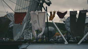 Movie still from “Alex Nicol - Trust” (2020), directed by Paz Ramirez – Medium shot, Low angle