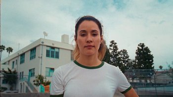 Movie still from “Tussilago - Flirtation Forever” (2020), directed by SWIM CLUB – Close Up shot, Low angle