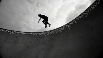 Movie still from “Tussilago - Flirtation Forever” (2020), directed by SWIM CLUB – Wide shot, Low angle