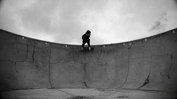 Movie still from “Tussilago - Flirtation Forever” (2020), directed by SWIM CLUB – Wide shot, Low angle