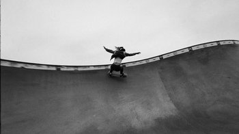 Movie still from “Tussilago - Flirtation Forever” (2020), directed by SWIM CLUB – Wide shot, Low angle