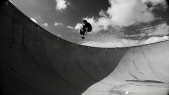 Movie still from “Tussilago - Flirtation Forever” (2020), directed by SWIM CLUB – Wide shot, Low angle