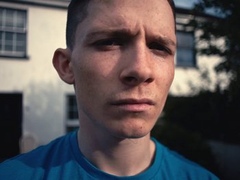 Movie still from “Willzee & delush - Dear Friend II” (2020), directed by Dave O’Carroll – Close Up shot, Low angle