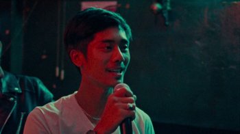 Movie still from “DMA’S - Life Is A Game Of Changing (Director’s Cut)” (2020), directed by W.A.M. Bleakley – Close Up shot, Over the shoulder angle