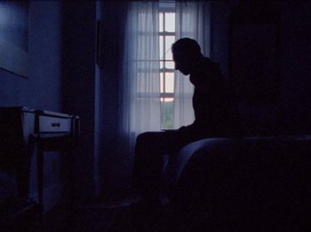 Movie still from “Black Fly - Wait” (2019), directed by Patrick Golan – Wide shot, Low angle