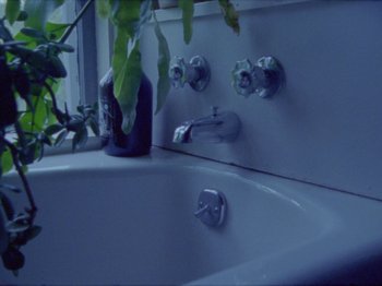 Movie still from “Black Fly - Wait” (2019), directed by Patrick Golan – Extreme Close Up shot, High angle